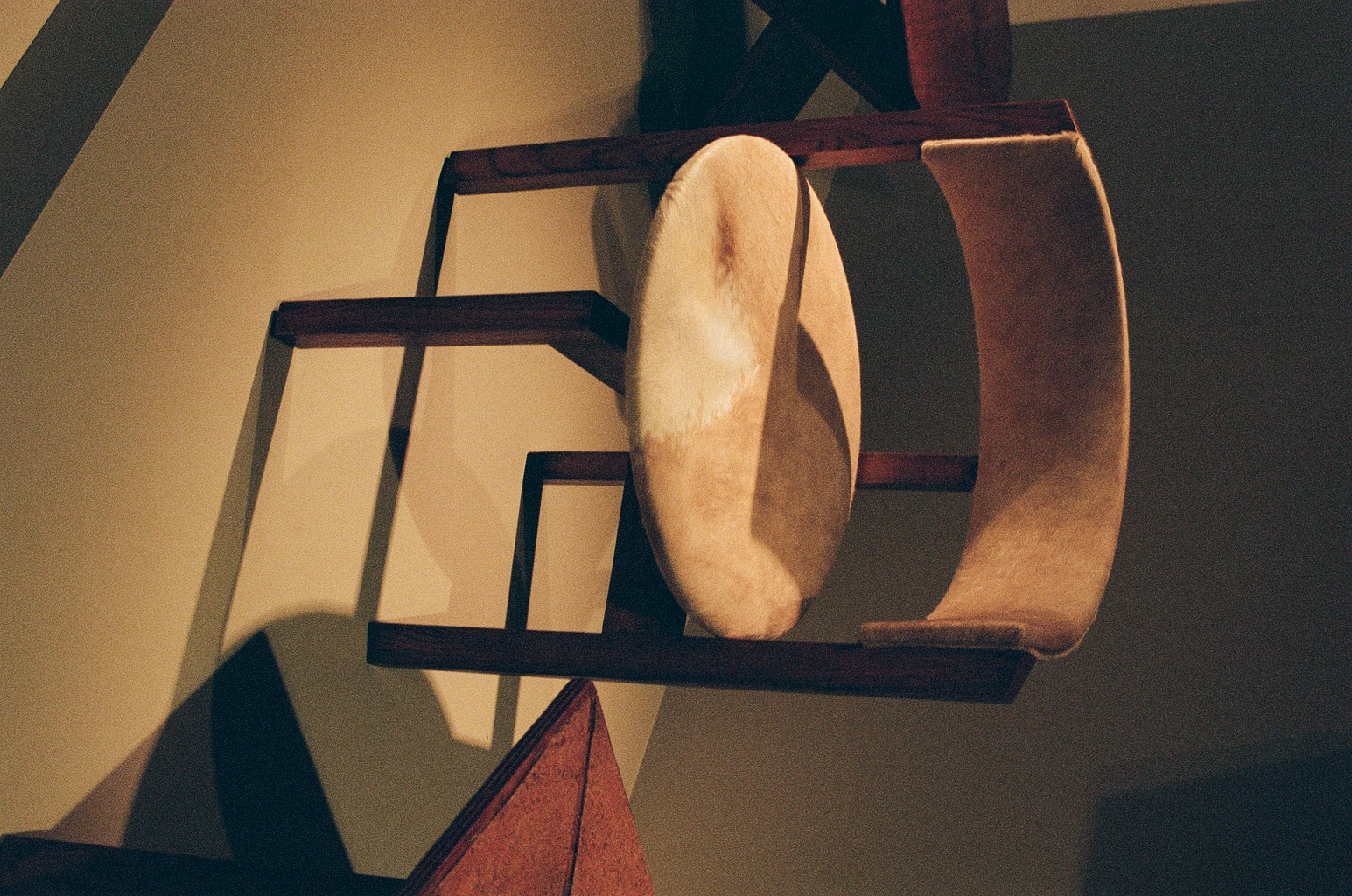 Hervé Baley, Single chair, c. 1963. Solid wood, plywood, and cowhide. 29 x 23 1/4 x 17 3/4 in.