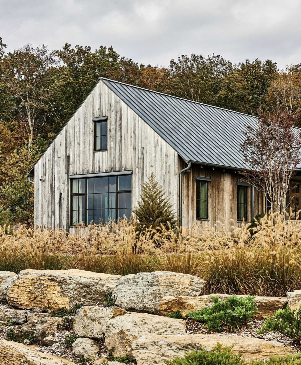 White Oak and limestone harmonize at a Knoxville home by Summerour Architects.