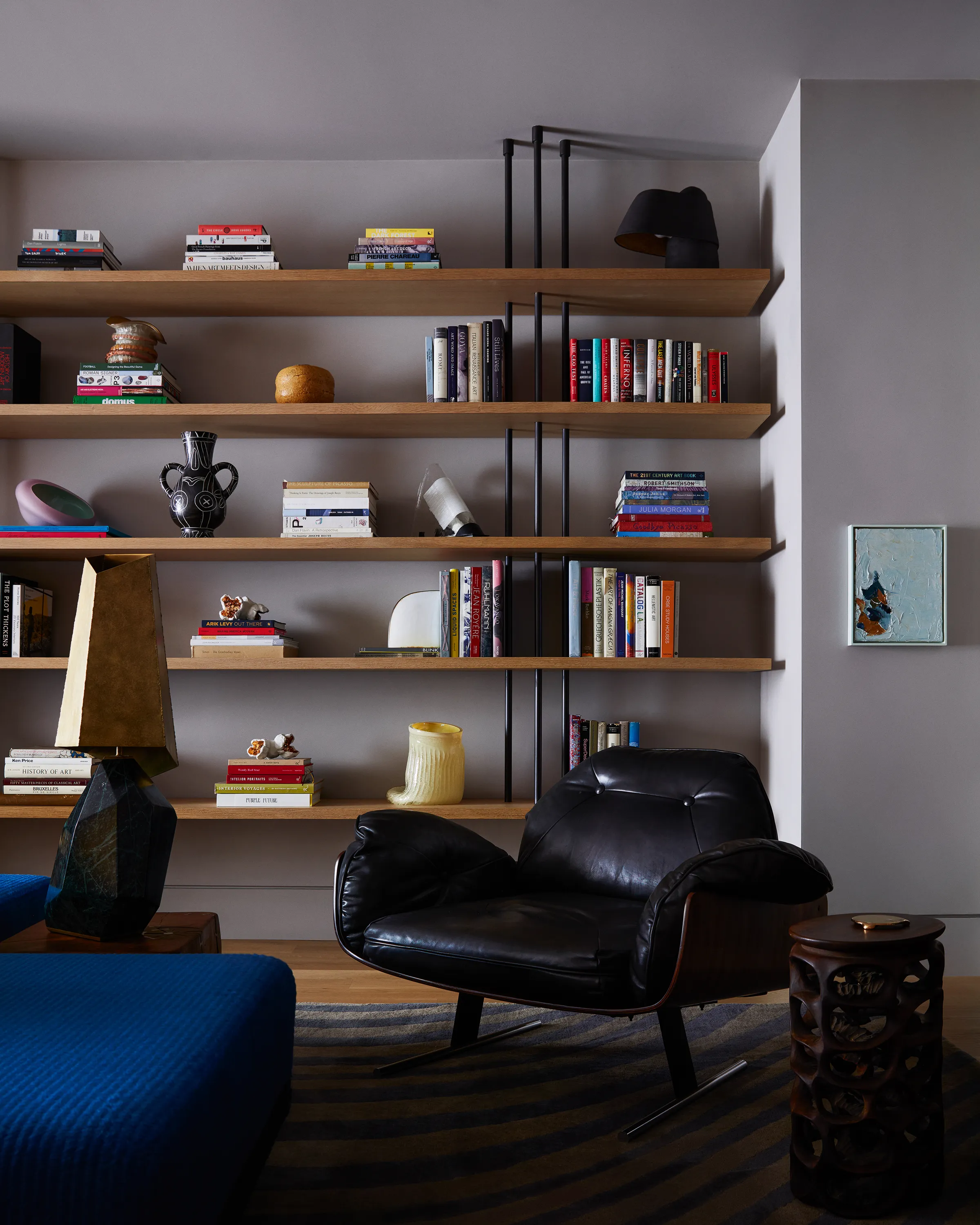 A Barometro Table Lamp 2.1 in Green Alpi by Giacomo Ravagli parallels the vibe of a c. 1960s “Presidencial” Jacaranda Armchair by Jorge Zalszupin as small works by Guy Overfelt, Pae White, The Long Confidence, Marco Minetti, and more punctuate the backdrop.